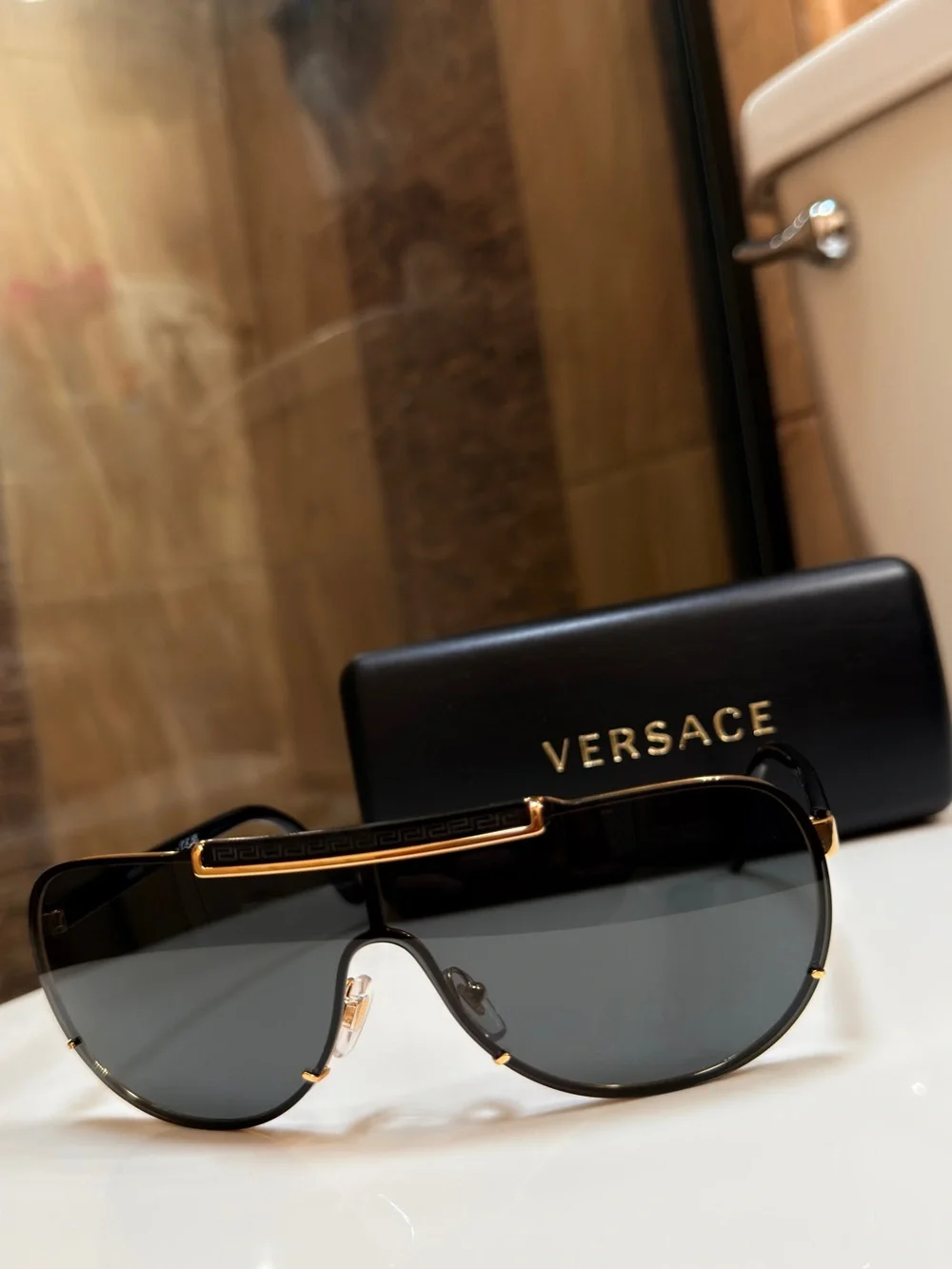 Versace MENS WOMENS Unisex Gold and Black Shield Sunglasses VE2140